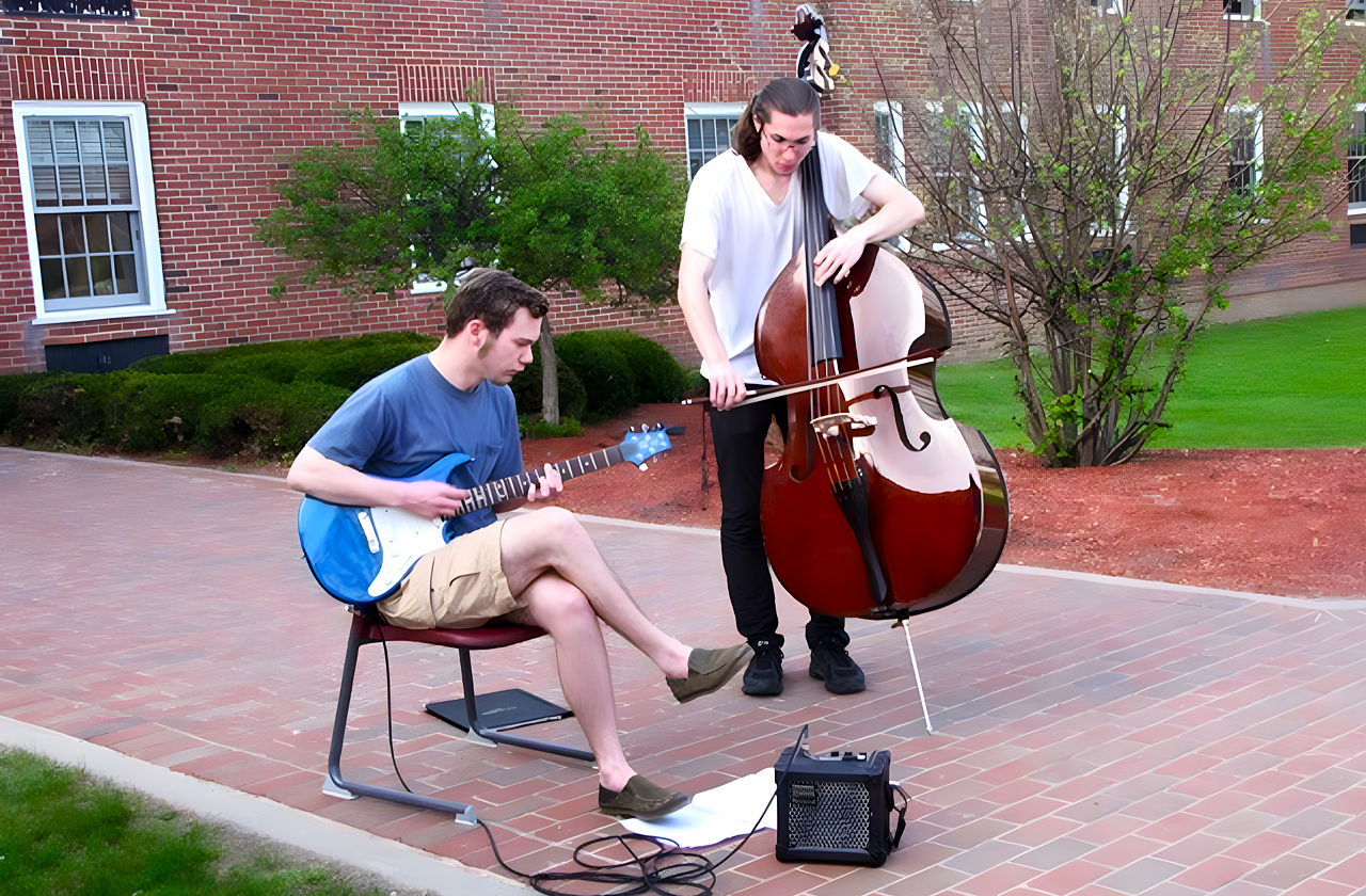 Musicians Kyle McGrath and James Myer providing a warm musical welcome
